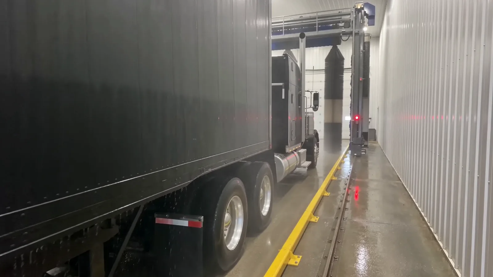 The cab of an articulated truck in a Europe Makine heavy vehicle wash