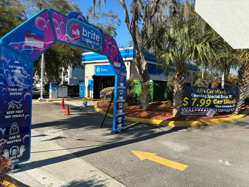 Entrance to Ali’s Car Wash in Ocala, Florida, with the wash lane beyond