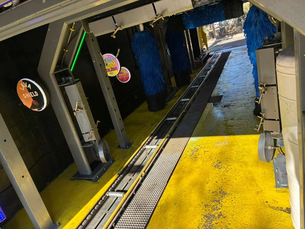 The conveyor and wash arches inside Ali’s Car Wash in Ocala
